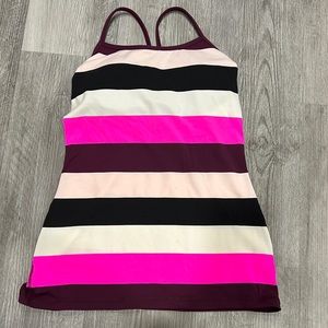 Lululemon fitted tank top with padded shelf bra. Size 8.